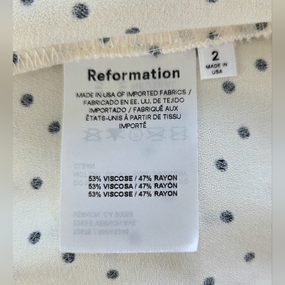 REFORMATION LACEY SMOCKED SLEEVE POLKA DOT MIDI DRESS. - Picture 6 of 6